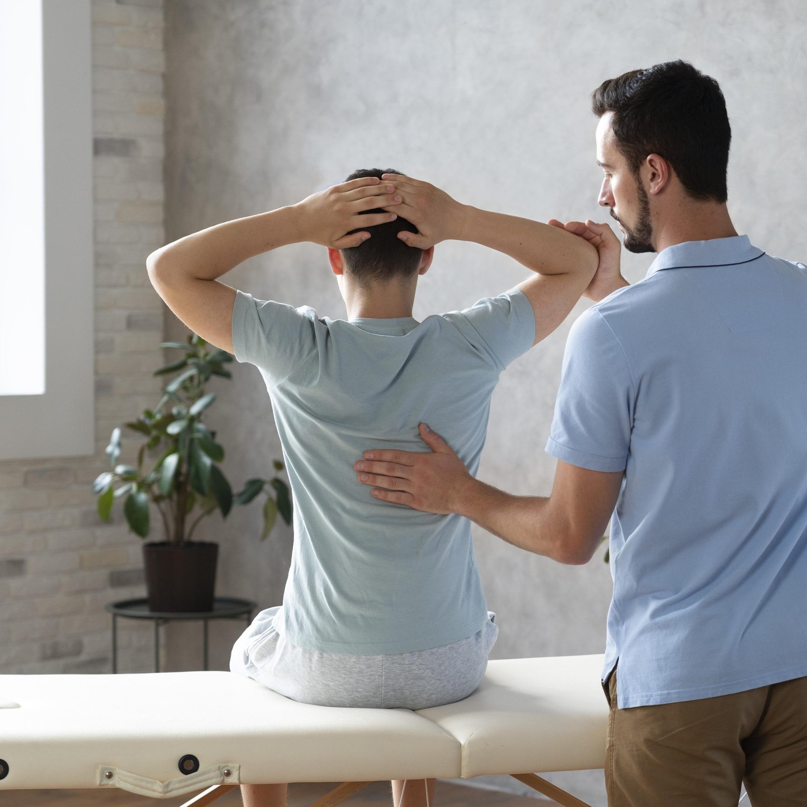 medium-shot-man-helping-patient-physiotherapy-1-scaled